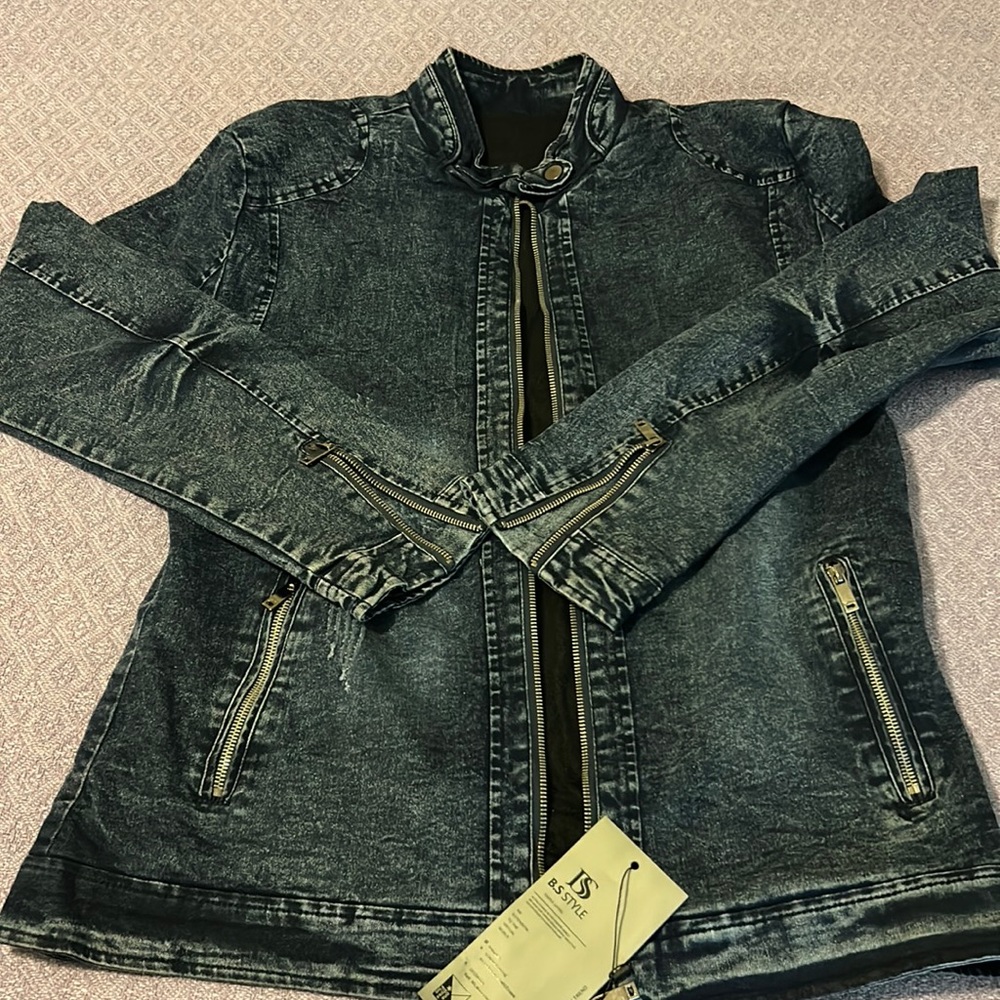 NEW jean jacket runs small (3XL but fits like more like a L/XL). Lined inside